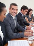 Smiling attractive businessman in a meeting