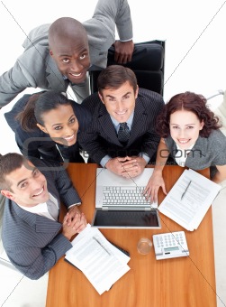 Business people working together with a laptop