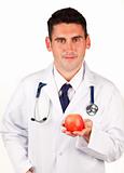 Close-up of a doctor holding an apple
