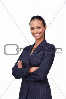 Smiling businesswoman with folded arms