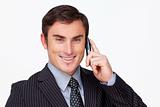 Portrait of an attractive businessman on phone against white