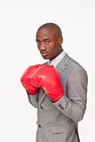 Afro-American businessman with boxing gloves