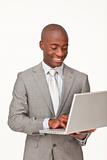 Afro-American businessman using a laptop