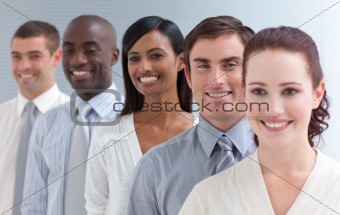 Business team in a line. Focus on an attractive man