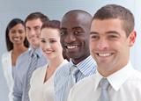 Business team in a line. Focus on an Afro-American man