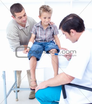 Doctor checking a patient reflexes