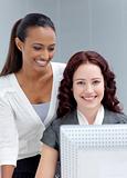 Beautiful businesswomen working together in office