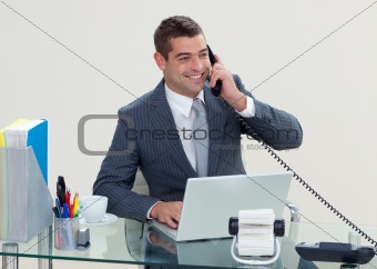 Manager on phone in his office