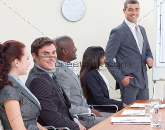Businessteam in a meeting listening to a colleague
