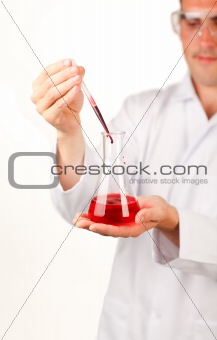 Scientist conducting blood to a test-tube