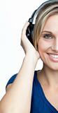 Woman listening to music with headphones on