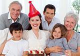 Grandparents, parents and children celebrating a birthday