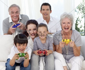 Family playing video games at home