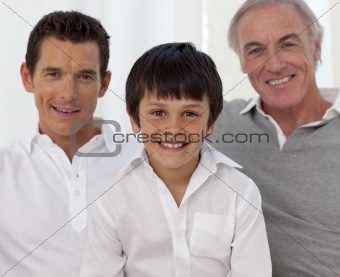Smiling son, father and grandfather