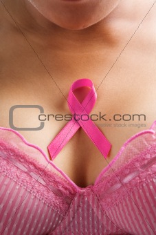 pink ribbon in woman chest