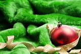 Christmas ornament on green fabric