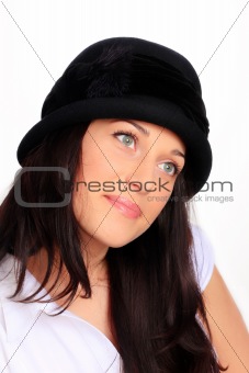 Young woman with black hat and black hair