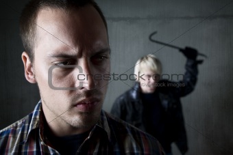 Man being stalked by criminal