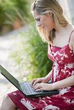 Young Woman Outside With Laptop