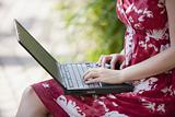 Woman Outdoors With Laptop