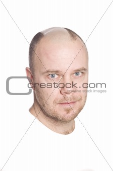 Man shaving his head