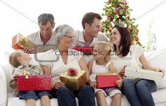 Family giving presents for Christmas