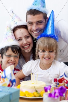 Portrait of happy family celebrating a birthday