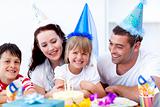 Young family celebrating a birthday
