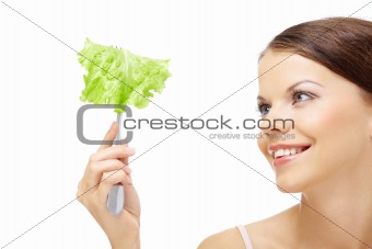 Girl and salad leaf