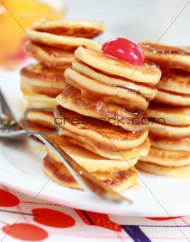 Sweet mini pancakes with pancake maker