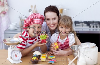 Mother and children baking in the kitchen