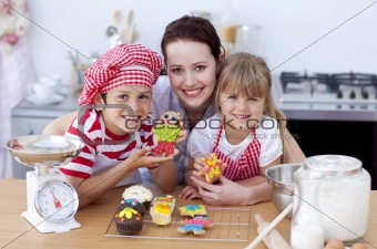 Mother baking with children in the kitchen