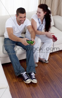 Frineds playing video games in living-room