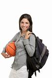 Attractive student with bag and basketball ball