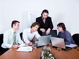 Team of young businessmen working at the office