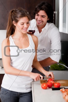 Happy young couple in the kitchen