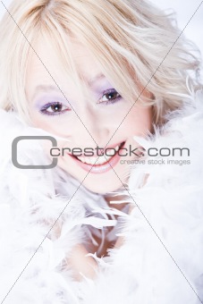 smiling young woman with white boa