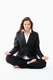 beautiful businesswoman in black suit exercising yoga - clipping path
