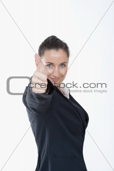 happy businesswoman  in black suit showing thumbs up