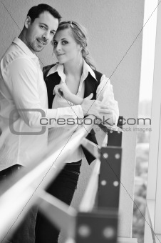 romantic happpy couple on balcony 