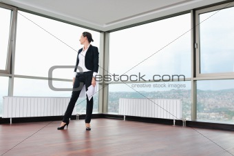 young business woman throw papers in air