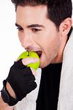 Fitness man having green apple