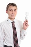 Student holding eco friendly light bulb