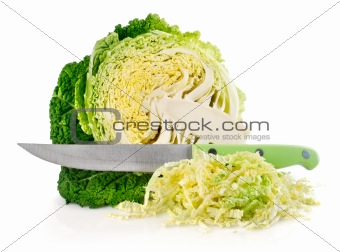 fresh green cabbage with cut and knife