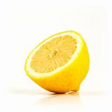 Fresh half of lemon on white