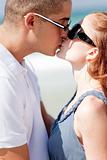 Romantic Couple kissing on the beach