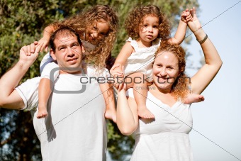 Happy family enjoying in the park