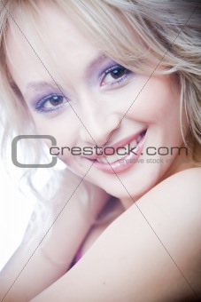 portrait of smiling young blond woman