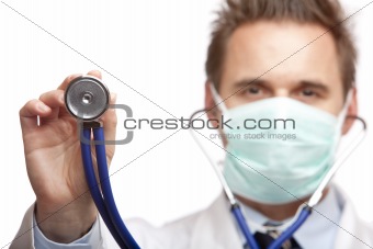 closeup of male doctor holding stethoscope ready for examination