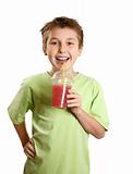 Smiling boy holding a fresh berry fruit juice